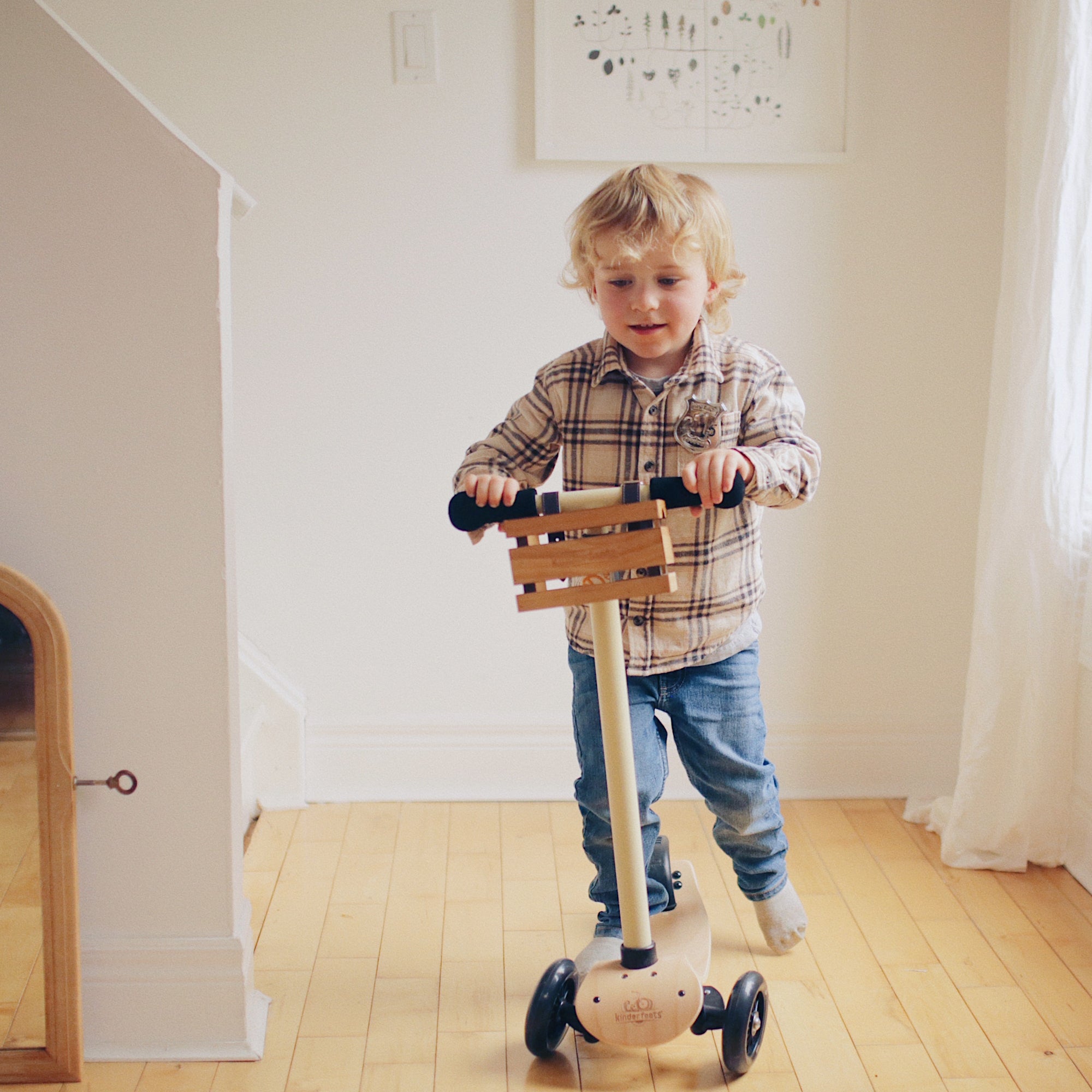Kinderfeets Kinder Scooter in Silver Sage with adjustable handlebars and two small wheels, suitable for young children.
