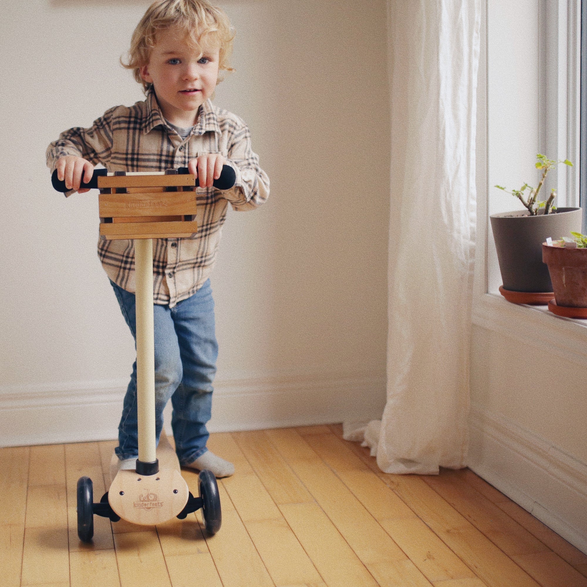 Kinderfeets Kinder Scooter in Silver Sage, lightweight kids' scooter with a sleek design, perfect for young children to ride and balance.
