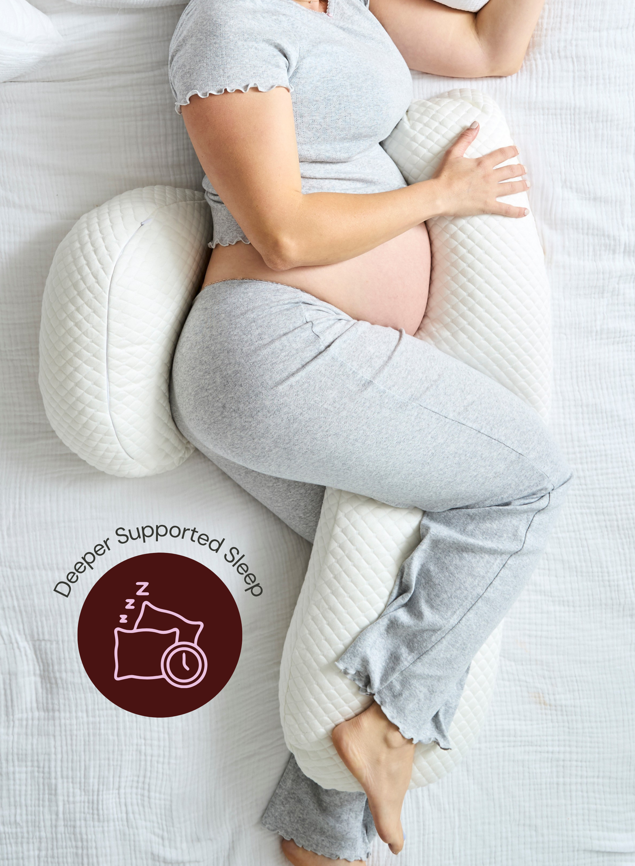 Belly Bliss pregnancy pillow in a soft, supportive U-shape for comfortable pregnancy rest and side sleeping support.