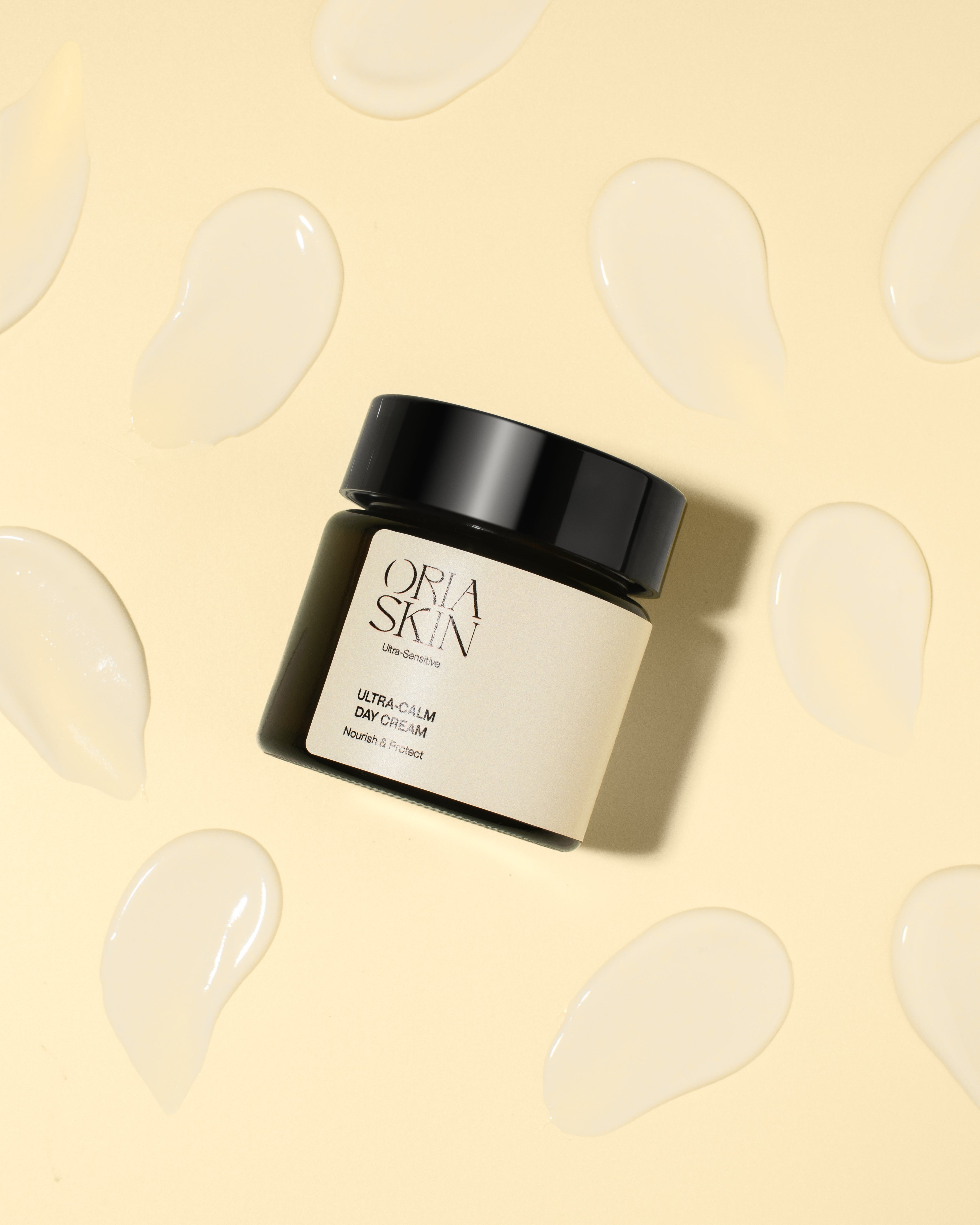 Oria Skin Ultra-Calm Day Cream in a sleek jar, showcasing its gentle, soothing skincare formula for sensitive skin.