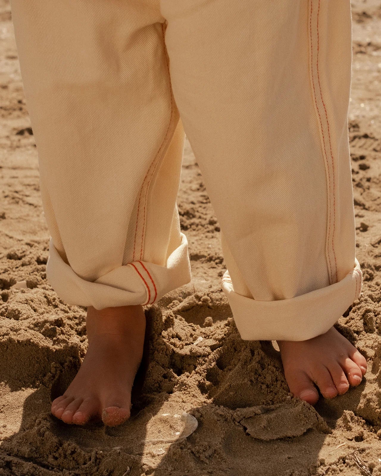 Grown Organic Everyday Denim Pant in Milk color, casual denim pant with a relaxed fit, shown on a model.