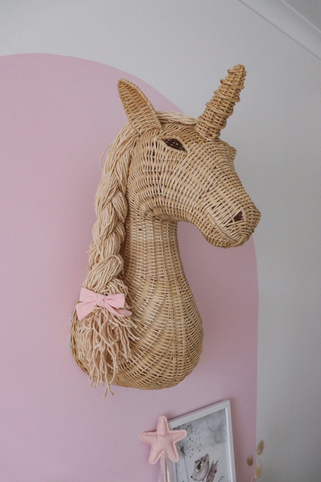 Rattan unicorn wall mount by Inkah Limited, handcrafted decorative wall art featuring a whimsical unicorn design.