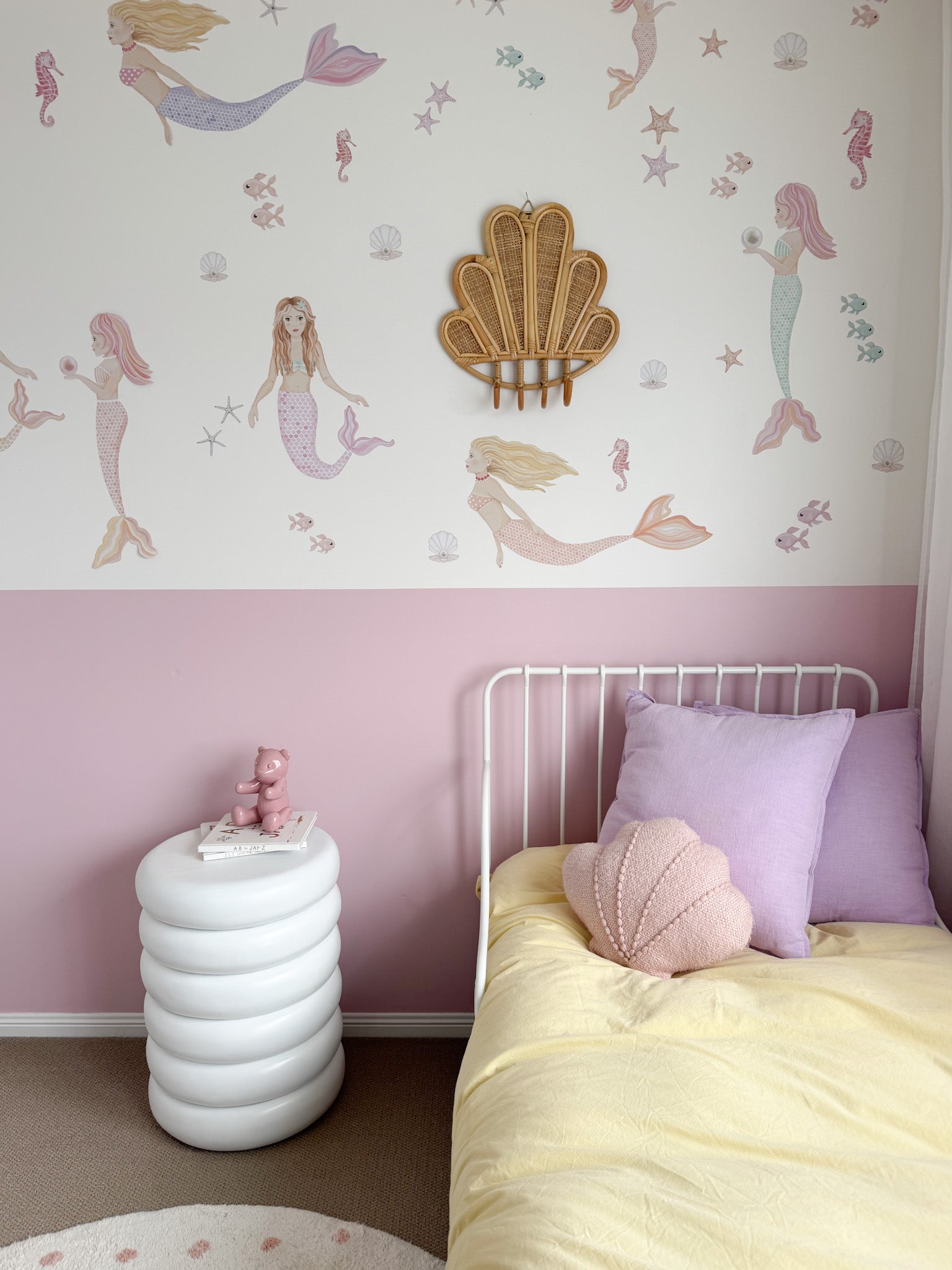 INKAH Rattan clam wall hook by Inkah Limited mounted on wall, showcasing natural rattan design and sturdy construction.