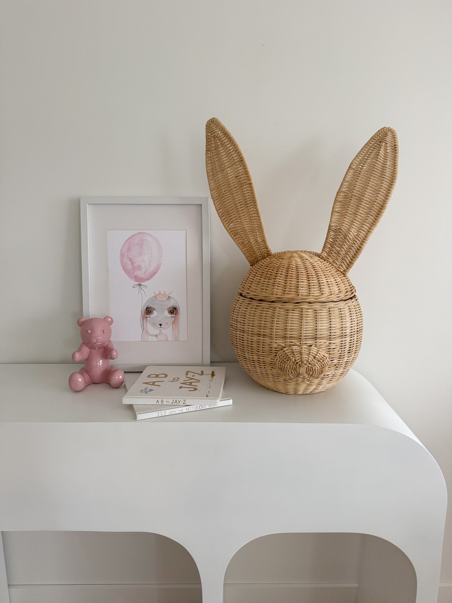 INKAH Limited rattan bunny basket with woven handle, ideal for storage or decorative use, featuring a cute bunny shape.