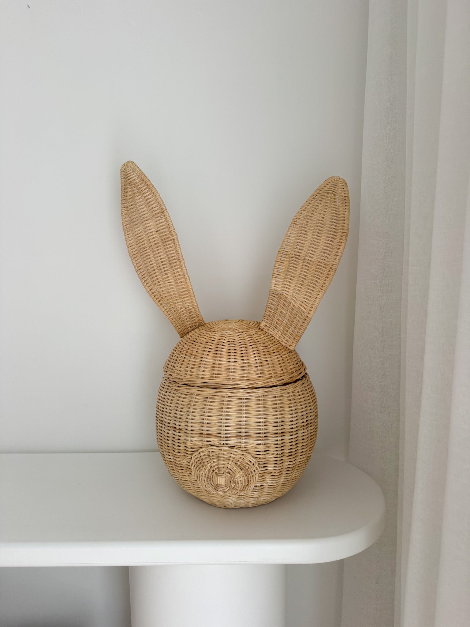 INKAH Limited rattan bunny basket with woven details, perfect for decorative storage or as a charming home accent.