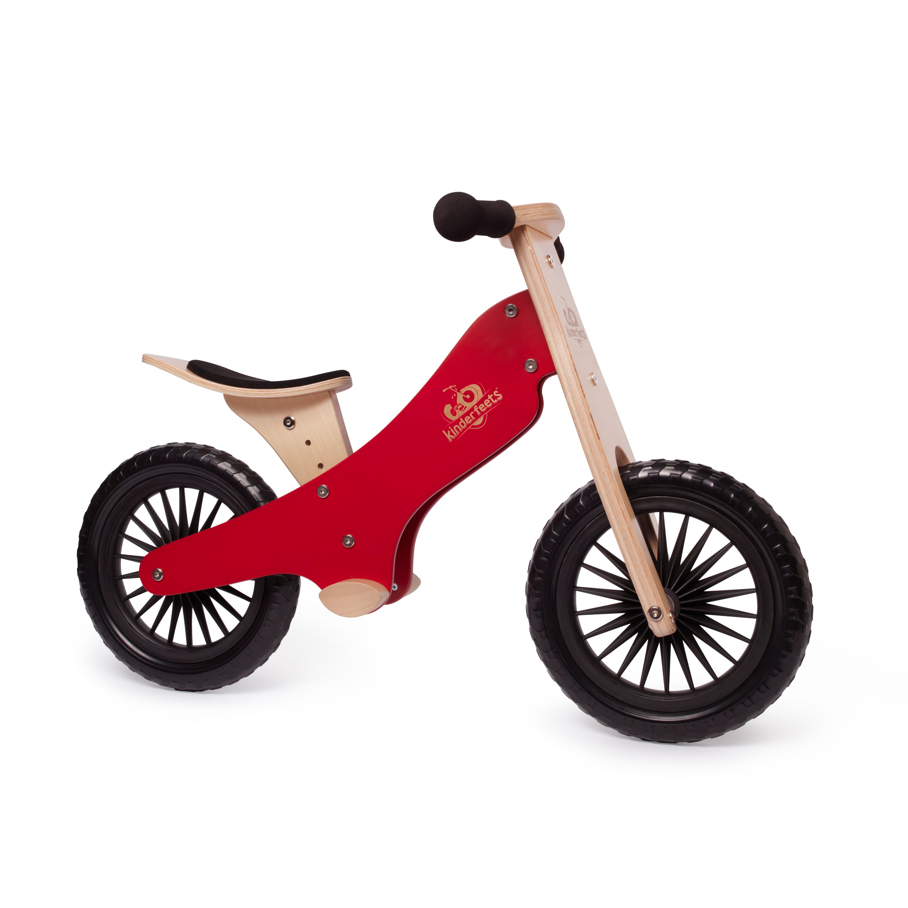 Kinderfeets Cherry Red balance bike for kids, featuring a wooden frame and ergonomic handlebars, shown from the right side.