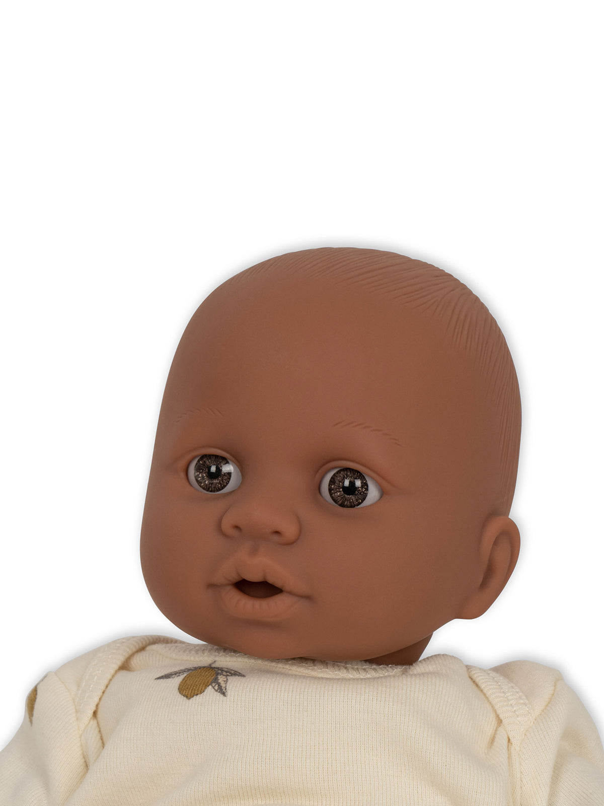 Konges Slojd Billie the Doll toy with colorful clothing and soft features, perfect for children’s imaginative play.