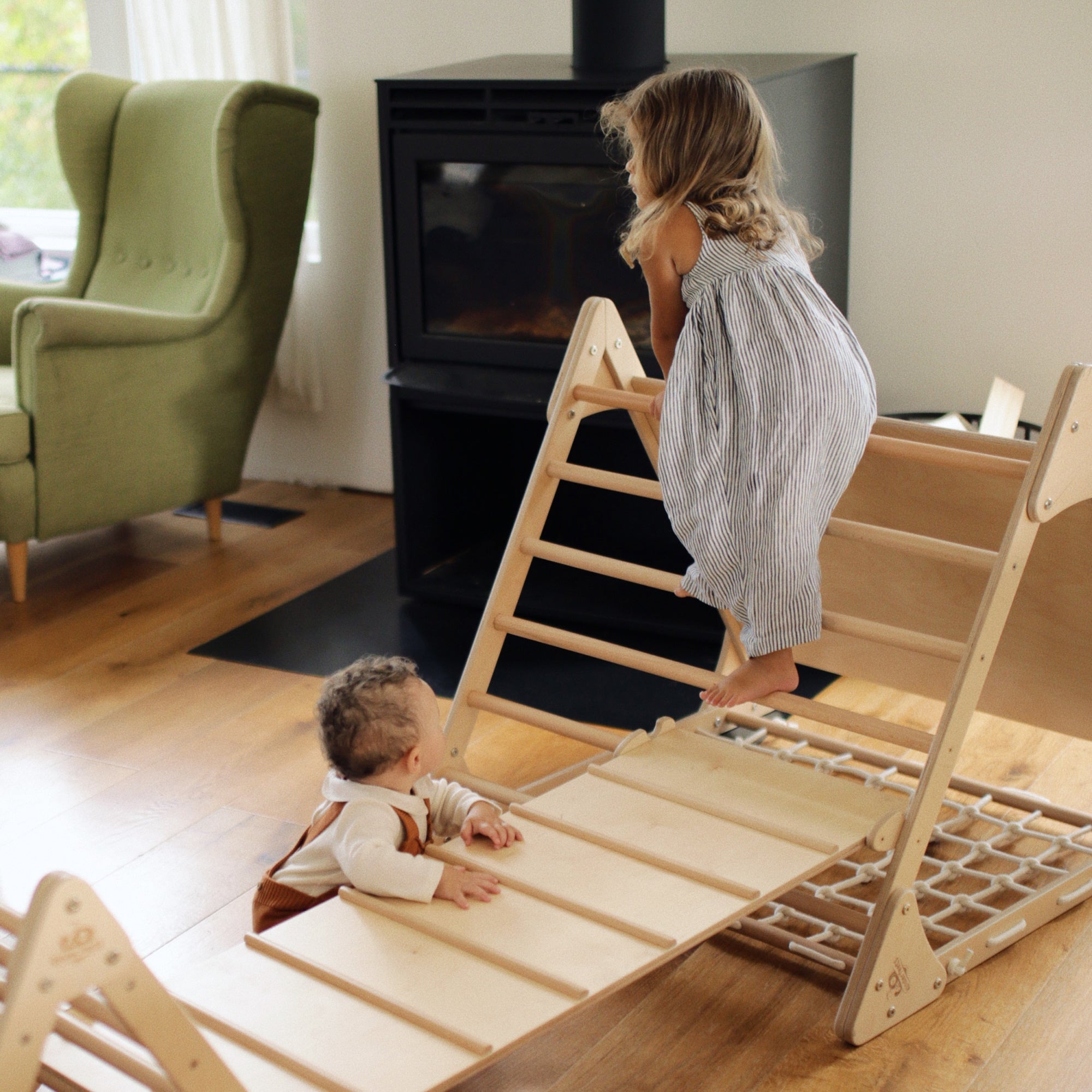 Large Kinderfeets Pikler Triangle climbing toy with wooden frame and colorful ramps for safe, fun toddler climbing activities.