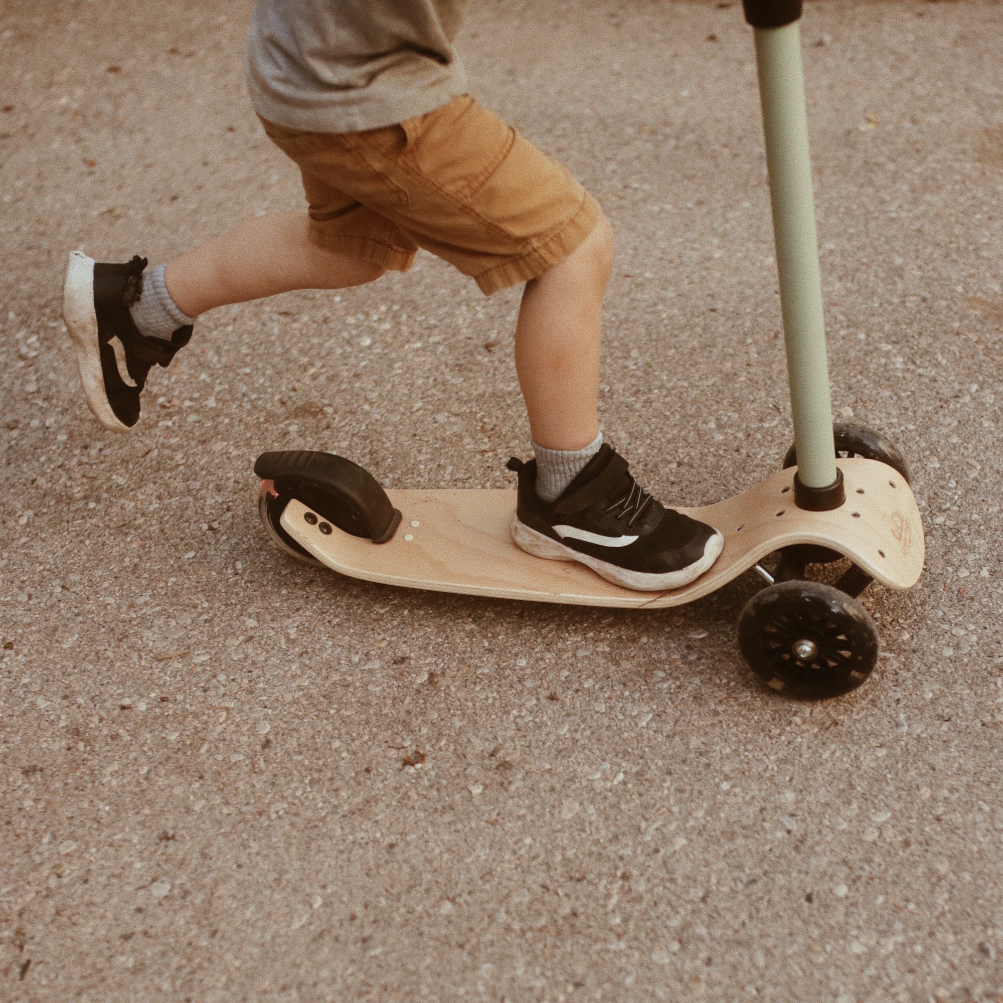 Silver Sage Kinderfeets scooter for kids, featuring a sleek design with handlebars and wheels, perfect for young riders.