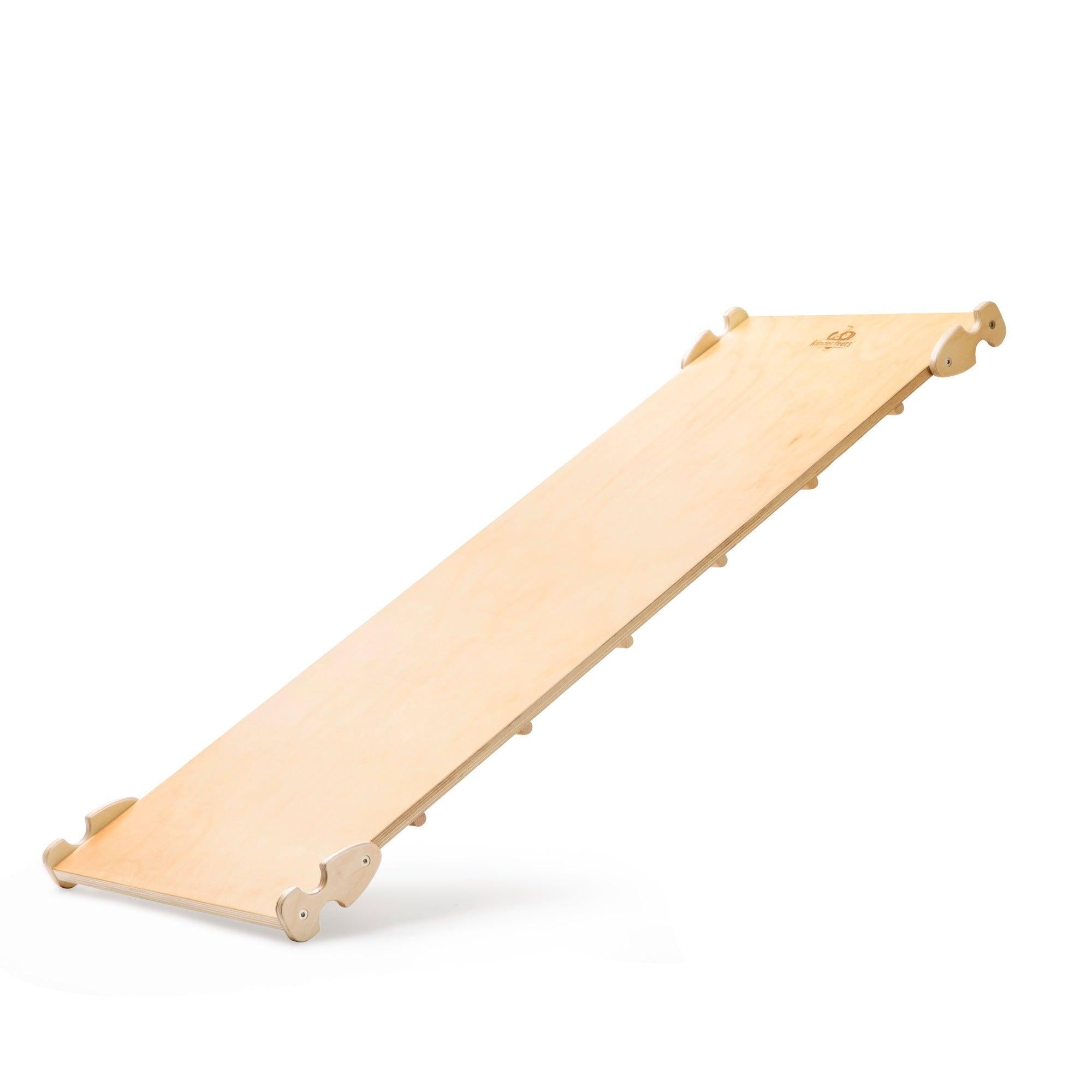 Kinderfeets Pikler ramp and slide climbing toy with wooden steps and slide for young children, designed for safe indoor play.