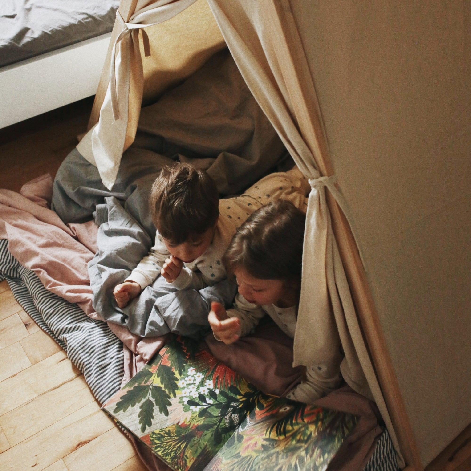 Colorful Kinderfeets Play Tent by Kinderfeets with fabric walls and a playful design for children's indoor and outdoor play.