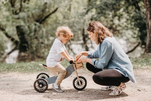 Kinderfeets Tiny Tot Plus slate blue trike and balance bike with a sturdy frame and ergonomic design for young children.