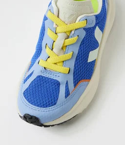 VEJA Canary Light Alveomesh Paros Ice Olympe shoe with white and light blue mesh upper and white sole, casual sneaker style.