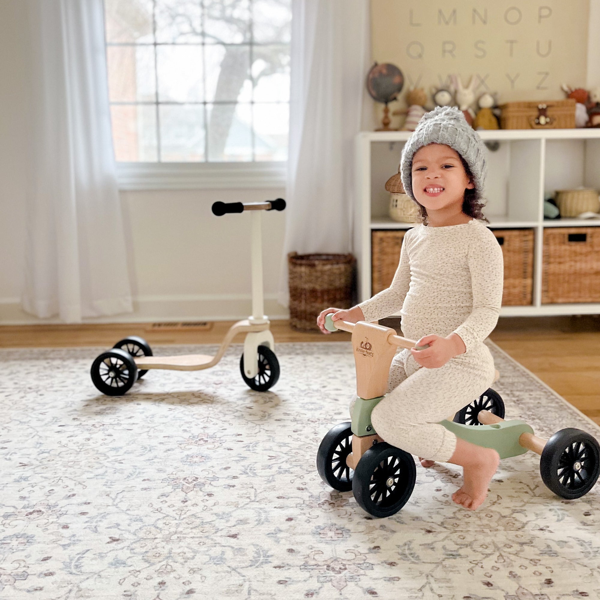 Kinderfeets Tiny Glider toy in vibrant colors, designed for young children to safely ride and develop balance skills.