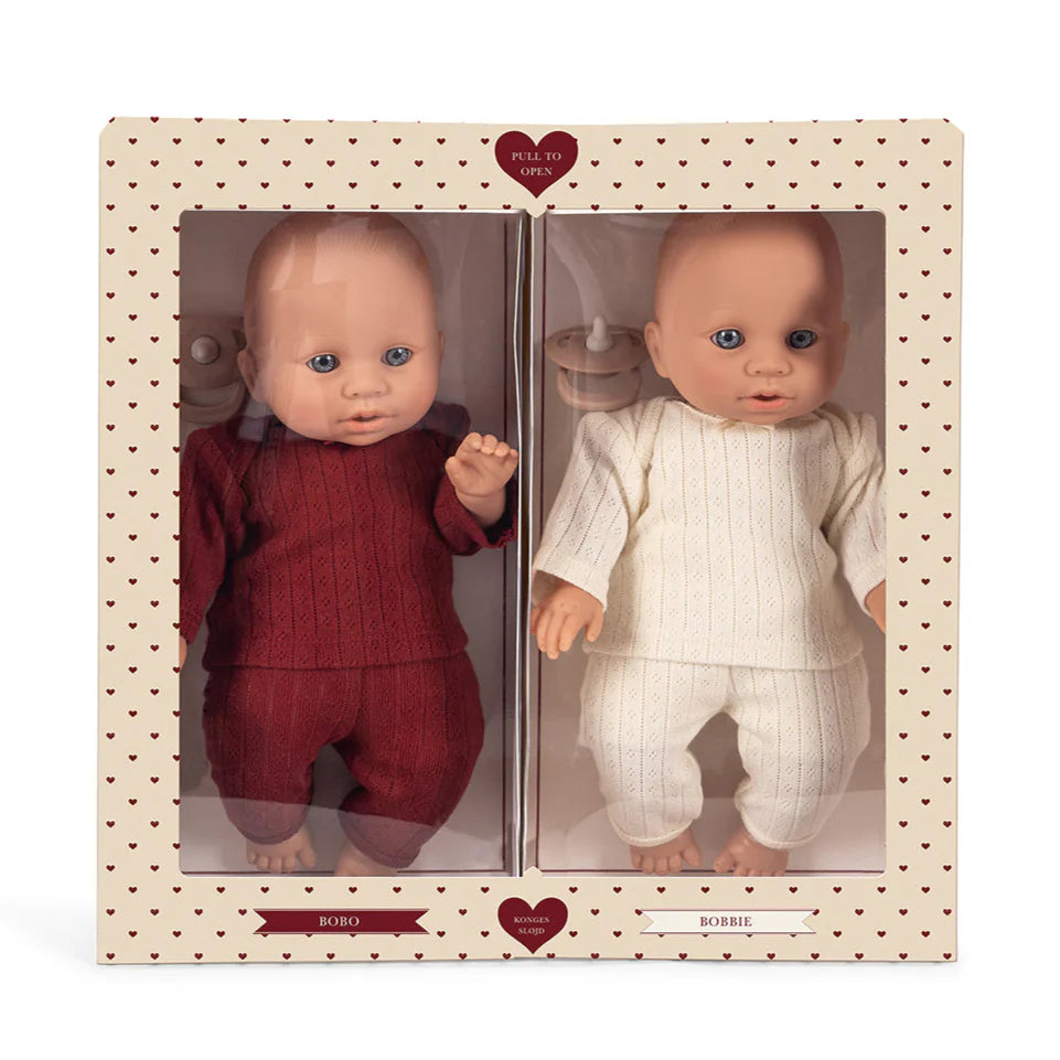 Konges Slojd Bobo and Bobbie baby dolls, soft toy toys with detailed fabric features, designed for gentle play and cuddling.