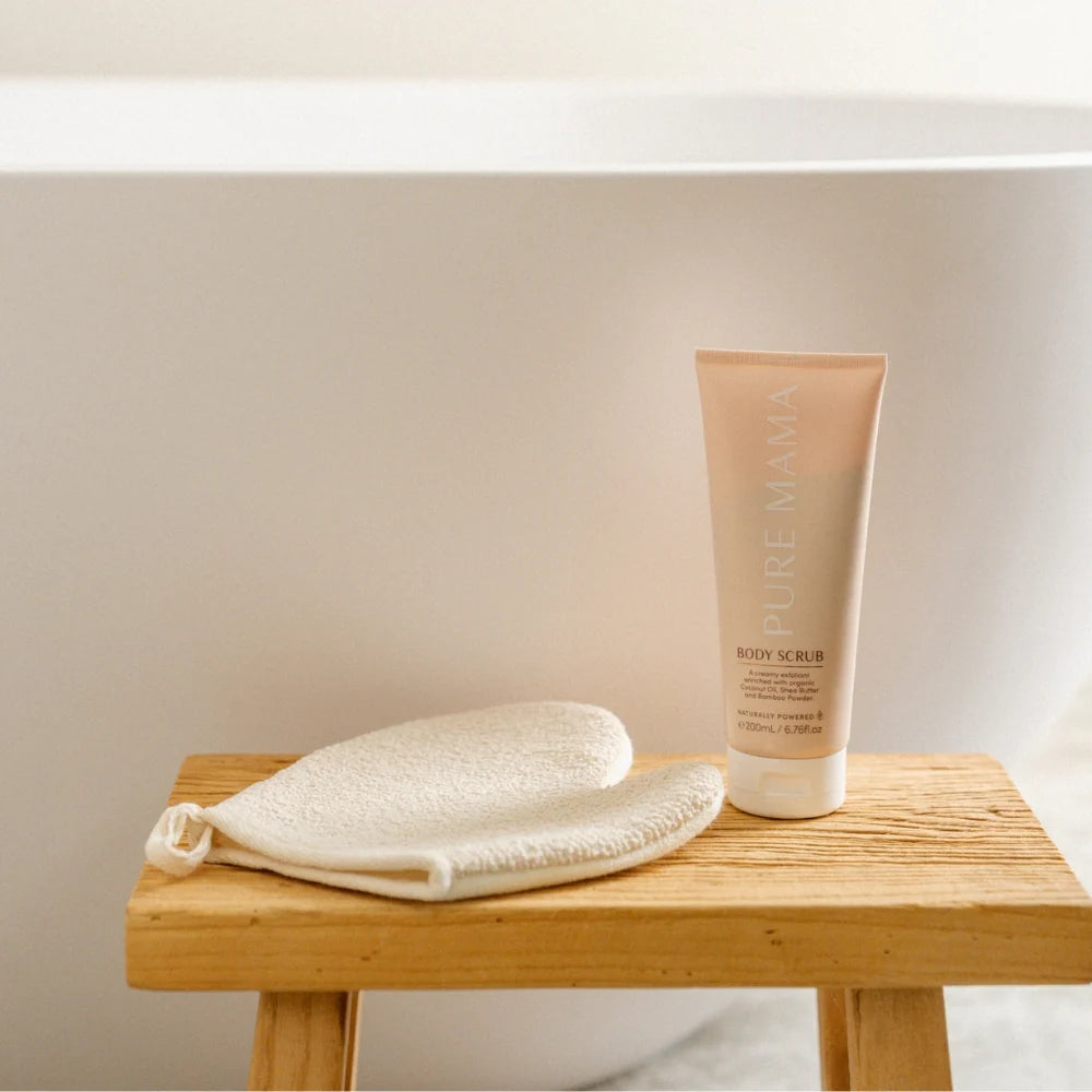 Pure Mama Bump Scrub for women, 200ml, natural stretch mark body scrub in a white jar with a pump dispenser.