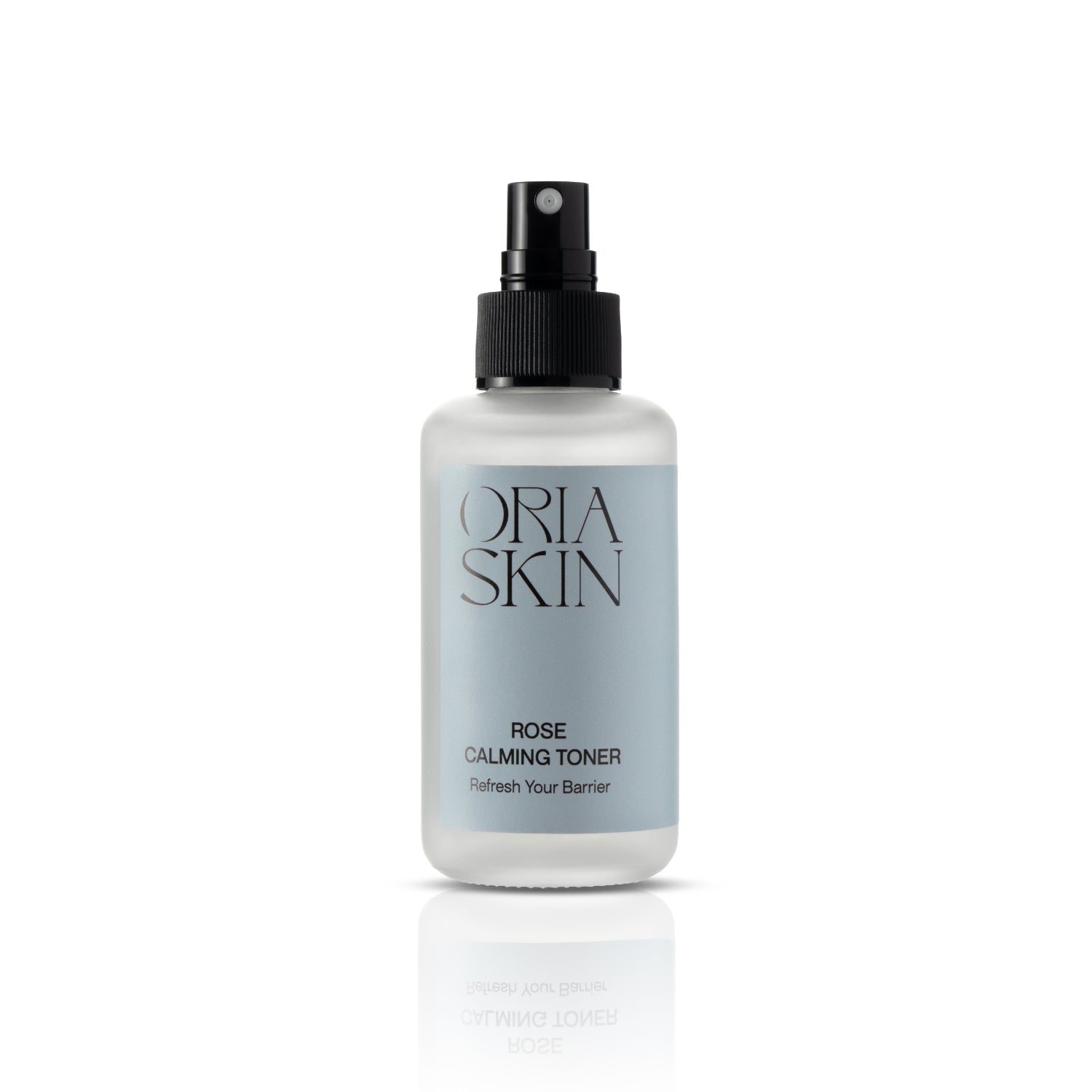 Oria Skin Rose Calming Toner 100ml in a clear bottle with a rose-themed label, designed for soothing skincare.