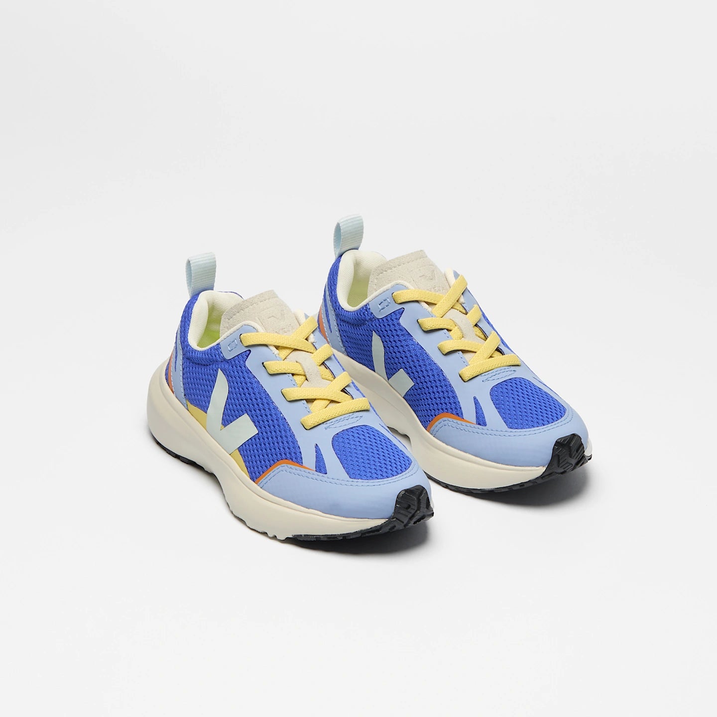 VEJA Canary Light Alveomesh sneakers in blue with white accents, featuring a lightweight vegan design and sporty style.