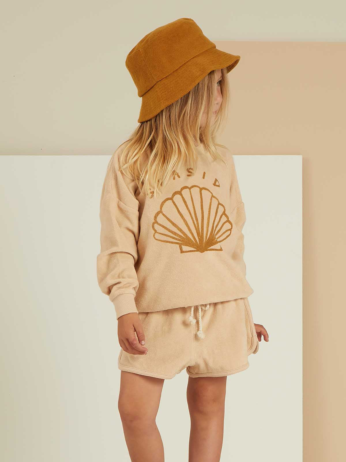 Rylee + Cru Terry Crewneck top in Seaside Shell with soft fabric and relaxed fit, shown on a model.