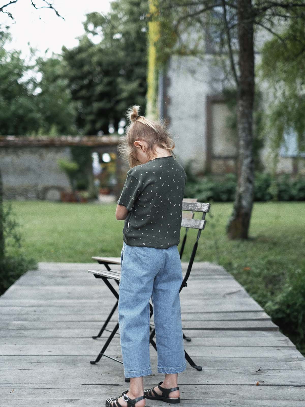 Organic Poudre Organic Honey T-Shirt featuring a simple, stylish design with a natural fabric look and subtle branding.