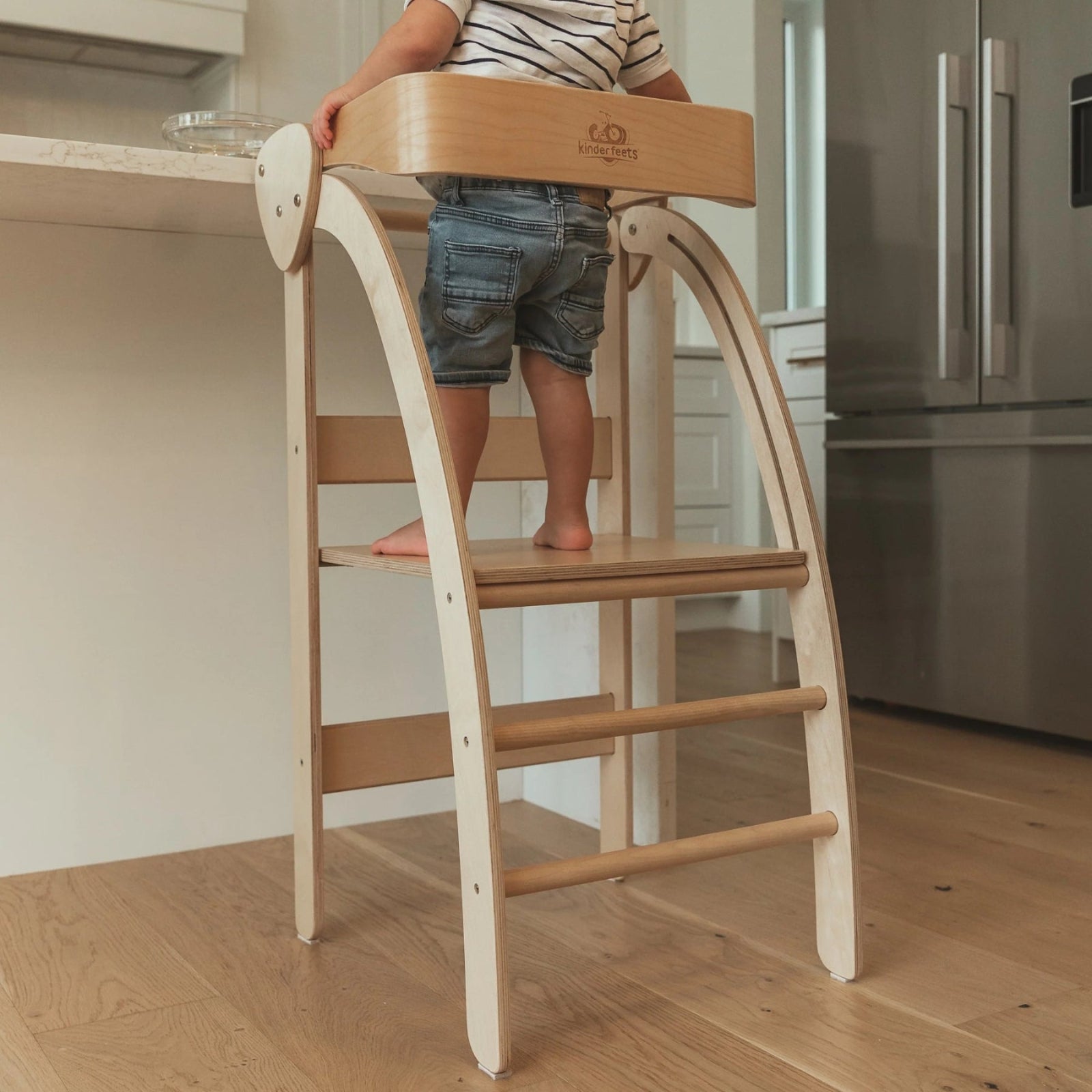 Kinderfeets Pikler observation tower in natural wood finish, a climbing toy for children with sturdy wooden steps and safety rails.