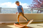 Kinderfeets Bamboo Kinderboard with natural wood finish, sturdy skateboard-style deck for kids' balance and coordination.