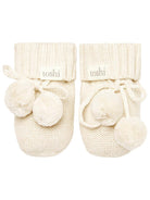Cream Toshi organic baby booties with soft fabric and cute design, perfect for cozy infants' footwear.