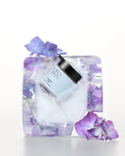 Oria Skin HydraDew Mask spread on a white surface, showing a hydrating facial mask with a smooth, gel-like texture.