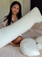 Belly Bliss pregnancy pillow in soft fabric, designed to support pregnant women with ergonomic U-shaped design.
