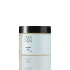 Oria Skin HydraDew Mask featuring a soothing gel texture and refreshing appearance in a clear jar with a blue lid.