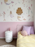 INKAH Rattan clam wall hook by Inkah Limited mounted on wall, showcasing natural rattan design and sturdy construction.