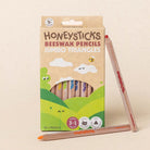 Set of ten Honeysticks Magic 3-in-1 beeswax crayons in jumbo triangle shapes, ideal for young artists and creative projects.
