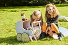 Wooden Kinderfeets Pram Walker in white, a classic toddler push toy with a sturdy wooden frame and playful design.