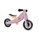 Kinderfeets Tiny Tot lavender balance bike for toddlers, featuring a lightweight, sturdy design with safety grips and a low saddle height.