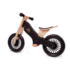 Kinderfeets black balance bike for kids, shown from the left side, lightweight wooden frame with black finish.