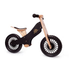 Kinderfeets black balance bike for kids, shown from the right side, lightweight wooden frame with black finish and ergonomic design.