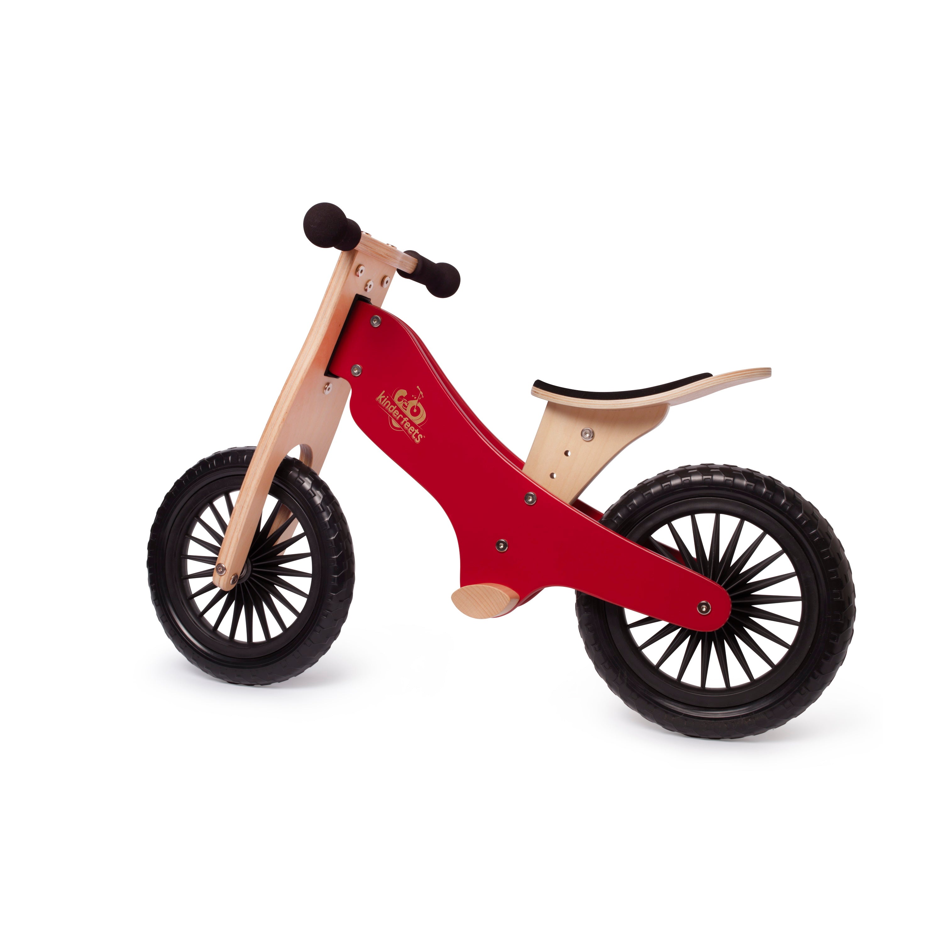 Kinderfeets Cherry Red balance bike for kids, featuring a sturdy frame and black handlebars, shown from the left side.