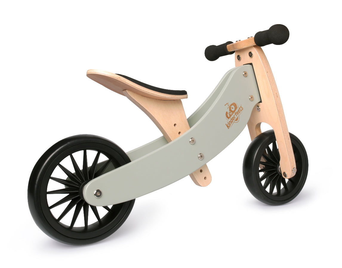 Kinderfeets Tiny Tots Plus trike in silver sage, a colorful balance bike for young children with two wheels and sturdy design.