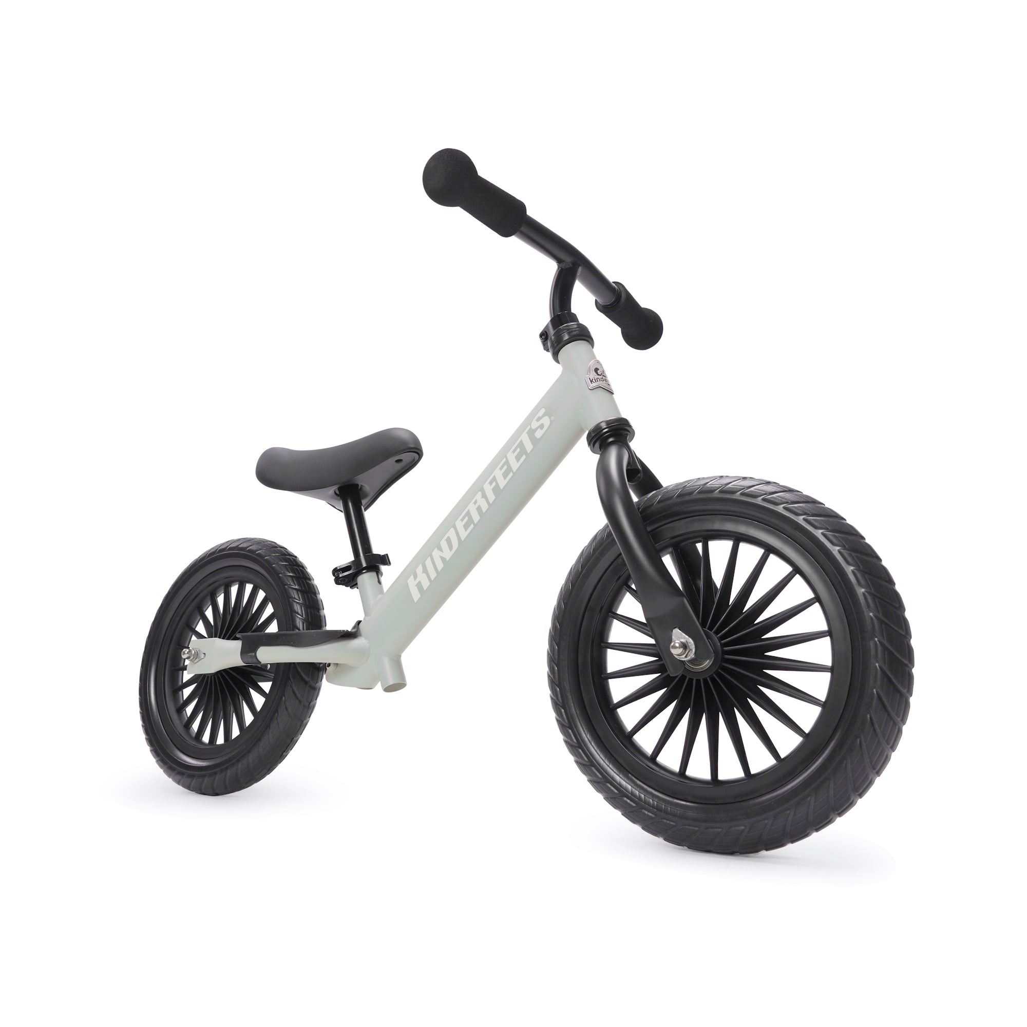 Kinderfeets Trail Bike in Silver Sage, a lightweight balance bike with a sleek design, suitable for young children learning to ride.