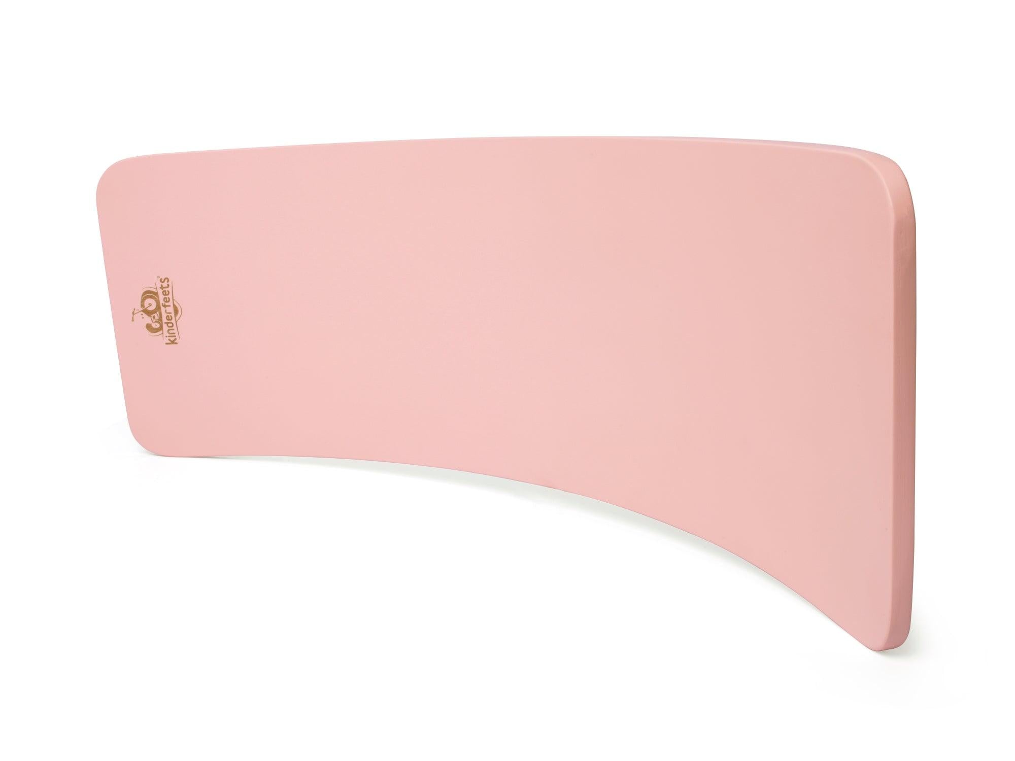 Kinderfeets Kinderboard balance board in rose color, wooden construction for kids' balance and coordination.