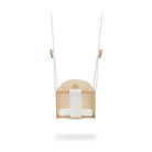 Kinderfeets baby swing hanging with strap and wooden frame, designed for gentle rocking and comfortable seating for infants.