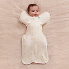 Love to Dream Swaddle Up Bamboo 1.0 TOG in Lemons, soft baby swaddle with lemon print, breathable and cozy for newborns.