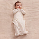 Love to Dream Swaddle Up™ Bamboo 1.0 TOG in Lemons, a soft, breathable swaddle for infants with a vibrant lemon print.