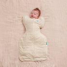 Love to Dream Swaddle Up™ Extra Warm 3.5 TOG in blush heart oatmeal, featuring soft fabric and secure swaddle design.