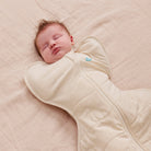 Love to Dream Swaddle Up™ Extra Warm 3.5 TOG in blush with heart and oatmeal pattern, designed for cozy swaddling.