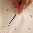 Love To Dream Swaddle Up All Seasons 1.5 TOG in Twigs, a soft baby swaddle with a natural leaf pattern and adjustable wings for comfort.