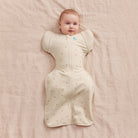 Love to Dream Swaddle Up™ Transition Bag All Seasons 1.5 TOG in Twigs, featuring soft fabric and adjustable arm openings for babies.