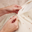 Love to Dream Swaddle Up™ Transition Bag All Seasons 1.5 TOG in Twigs with open zipper and cozy fabric for babies' sleep comfort.