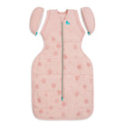 Love to Dream Swaddle Up Transition Bag in dusty pink, 2.5 TOG, warm sleep sack for babies, featuring soft fabric and secure design.