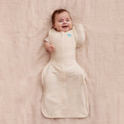 Love to Dream Swaddle Up™ Early Roller Transition Bag in oatmeal, soft fabric with zipper closure, designed for easy swaddling transition.